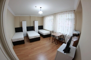 Üç Kişilik Oda